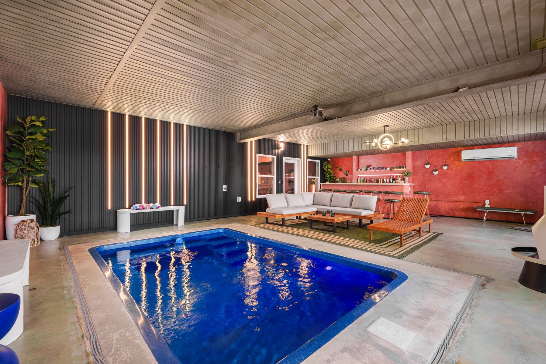 Indoor plunge pool and lounge at The Four Seasons Escape